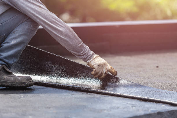 Professional Waterproofing technician working in Romulus, MI